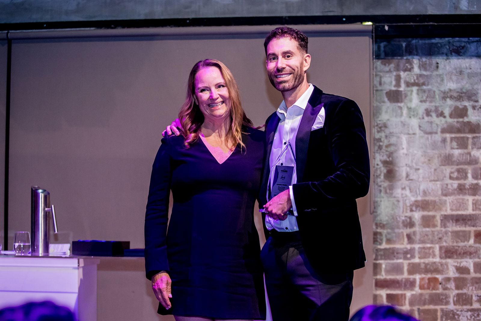 2025 Sydney Young Entrepreneur Awards Gala dinner Winners accepting trophies on stage at the 2025 Sydney Young Entrepreneur Awards